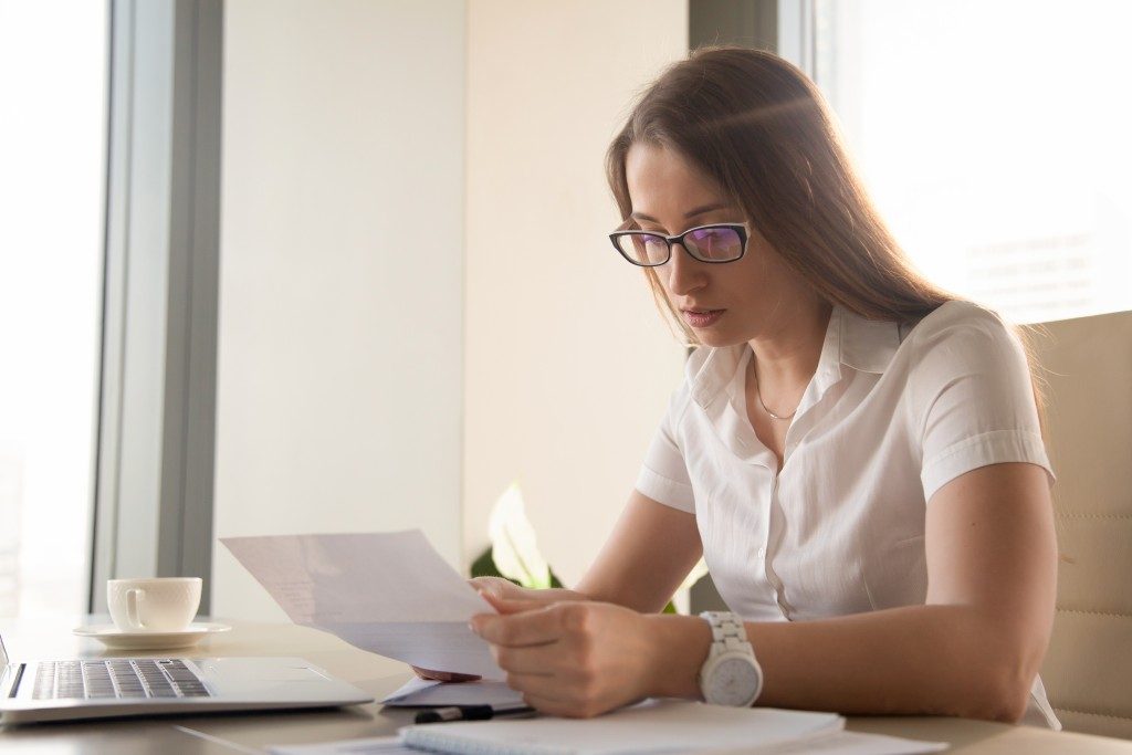 Woman settling finance details